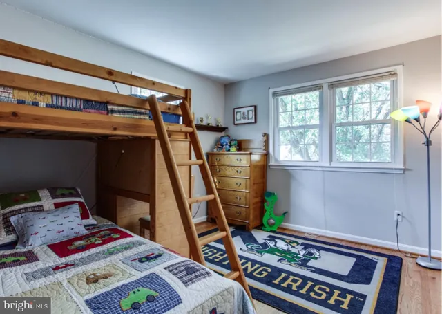 wooden floor and an empty room with wooden floor and stairs