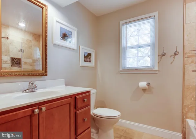 a bed room with a bed and a chandelier