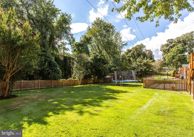 a view of a chair and table on the deck