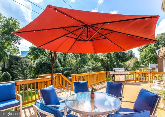 a view of a swimming pool with a yard