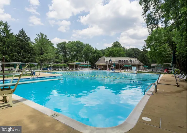 a view of an outdoor space and tennis court