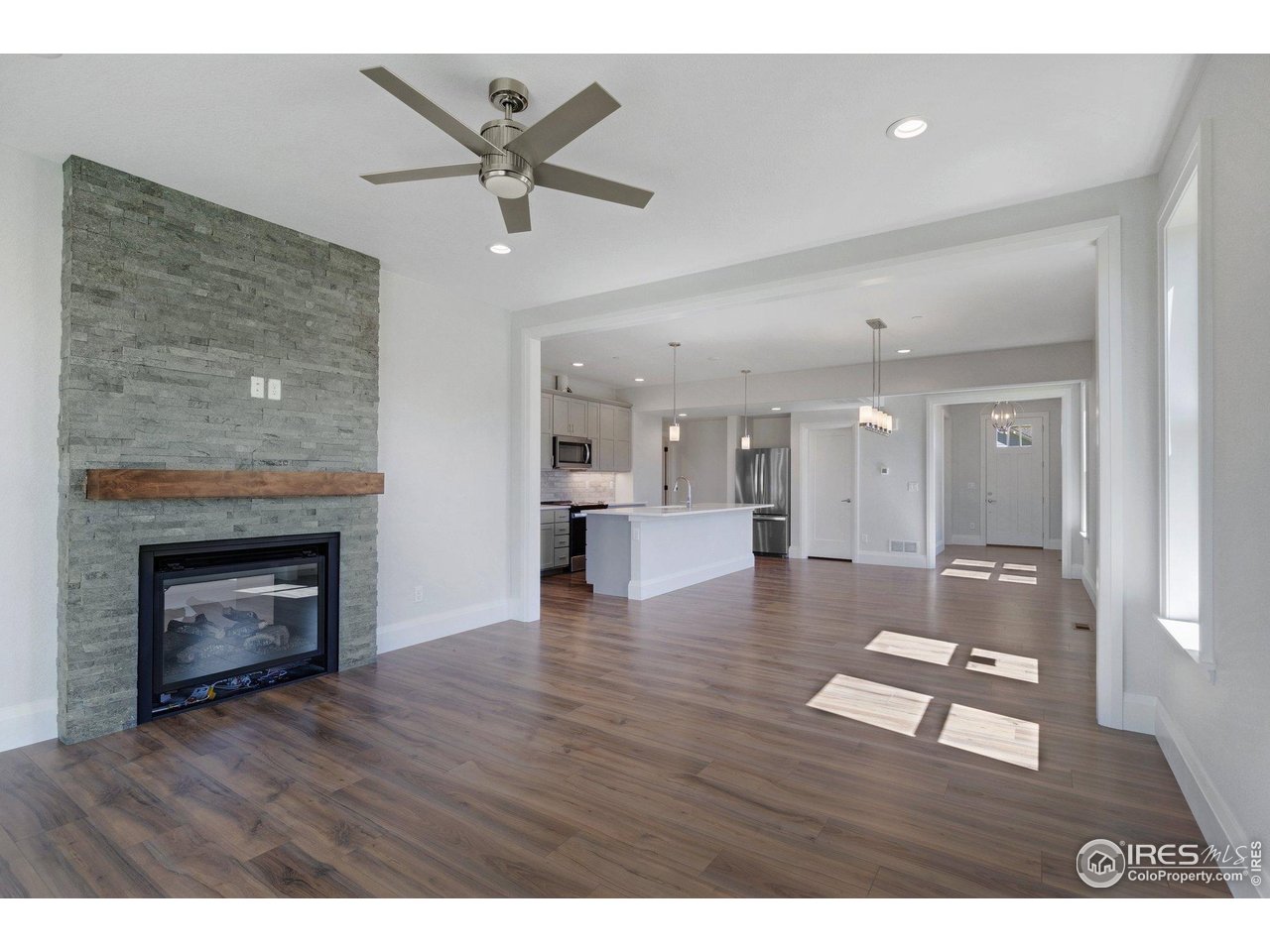 5700 2nd Road Greeley, CO 80634 - Photo 37 of 40 The wide-open floor plan is great for all ways of life