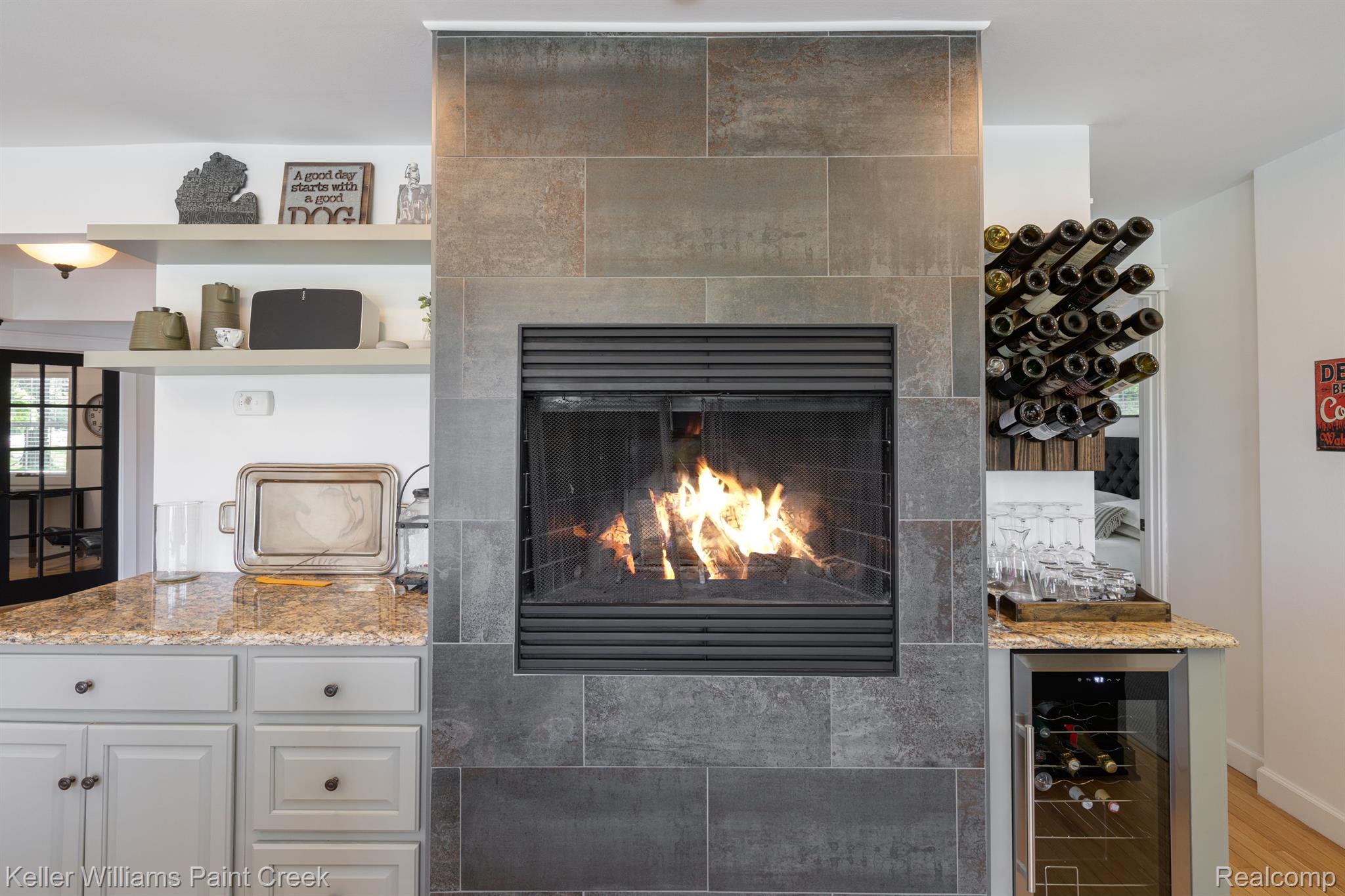 970 Rochester Road Leonard, MI 48367 - Photo 20 of 92 Natural Fireplace in Kitchen