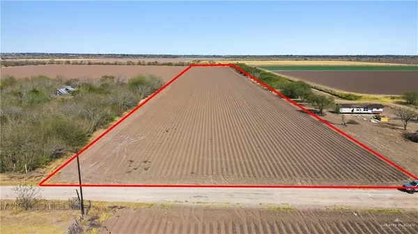 a view of swimming pool with a balcony