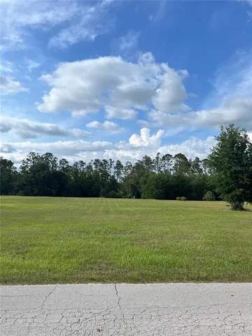 a view of an outdoor space and a yard