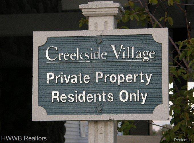 809 Garnet Court Rochester, MI 48306 - Photo 20 of 24 POOL ENTRANCE SIGN P1010006 (2