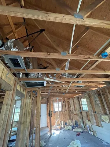 a view of a room with wooden walls