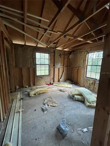 a view of a back yard of the house