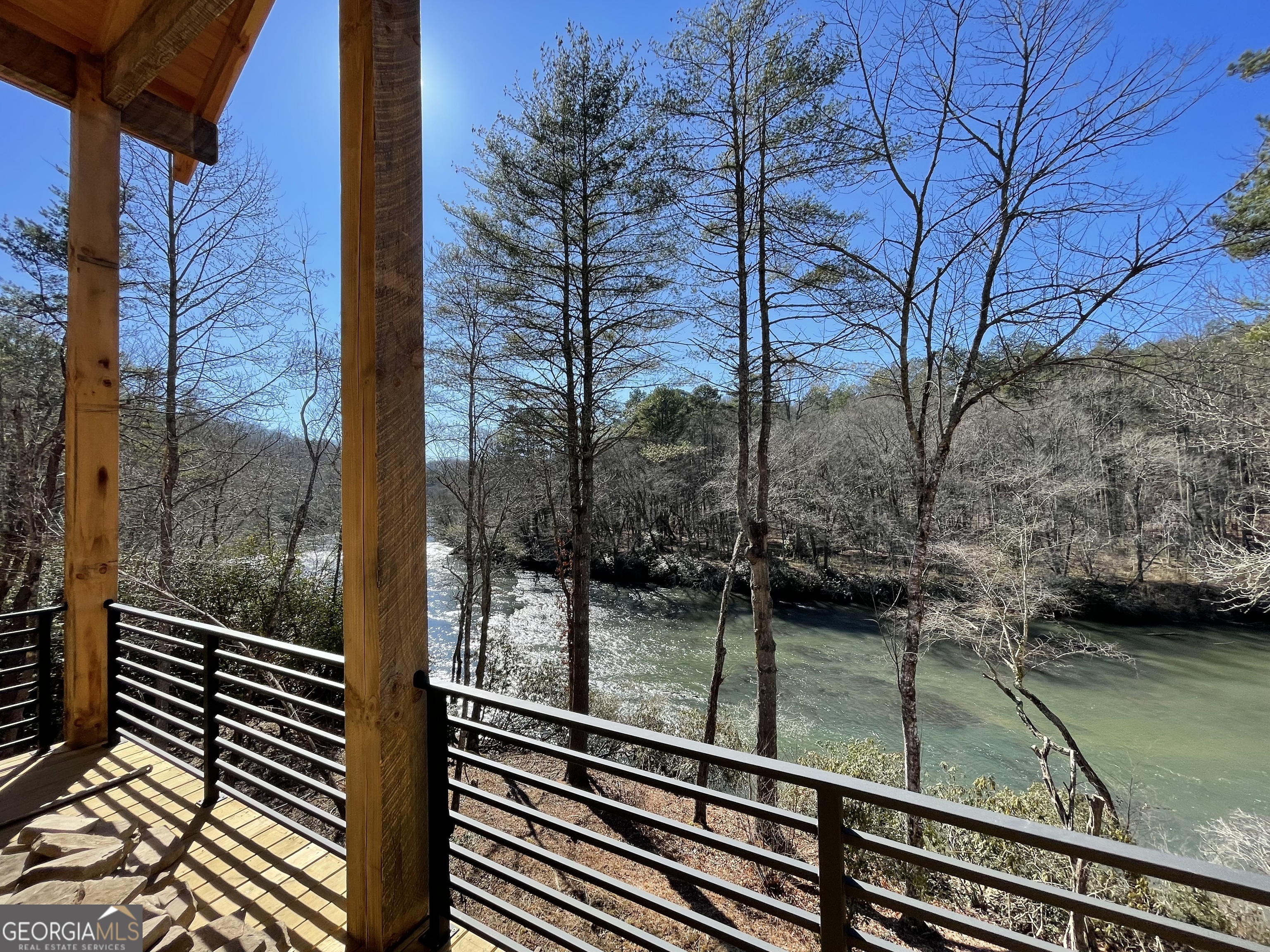 19 River Chase Way Mineral Bluff, GA 30559 - Photo 21 of 53 a view of a balcony with a yard