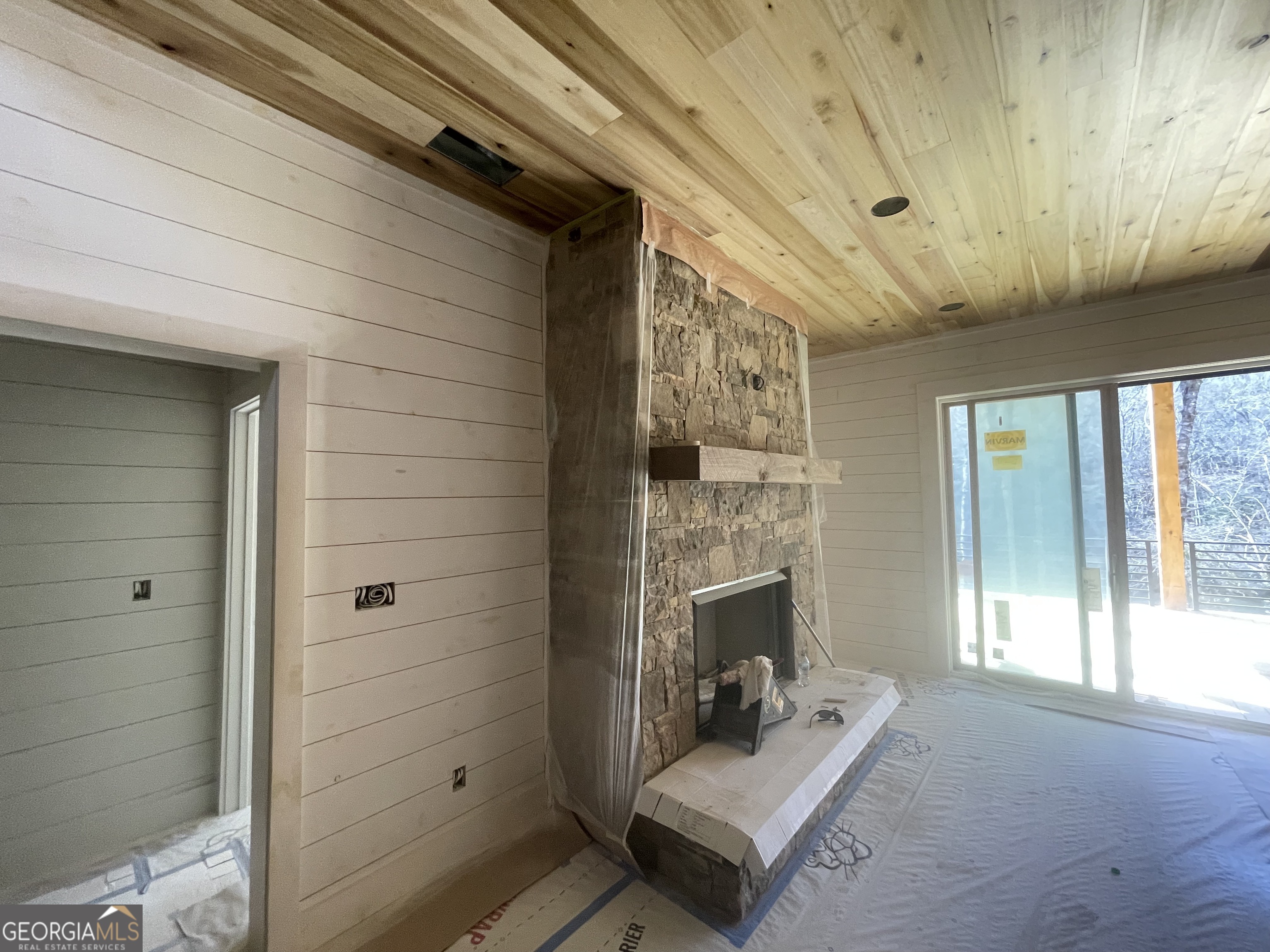 19 River Chase Way Mineral Bluff, GA 30559 - Photo 24 of 53 a living room with furniture and a fireplace