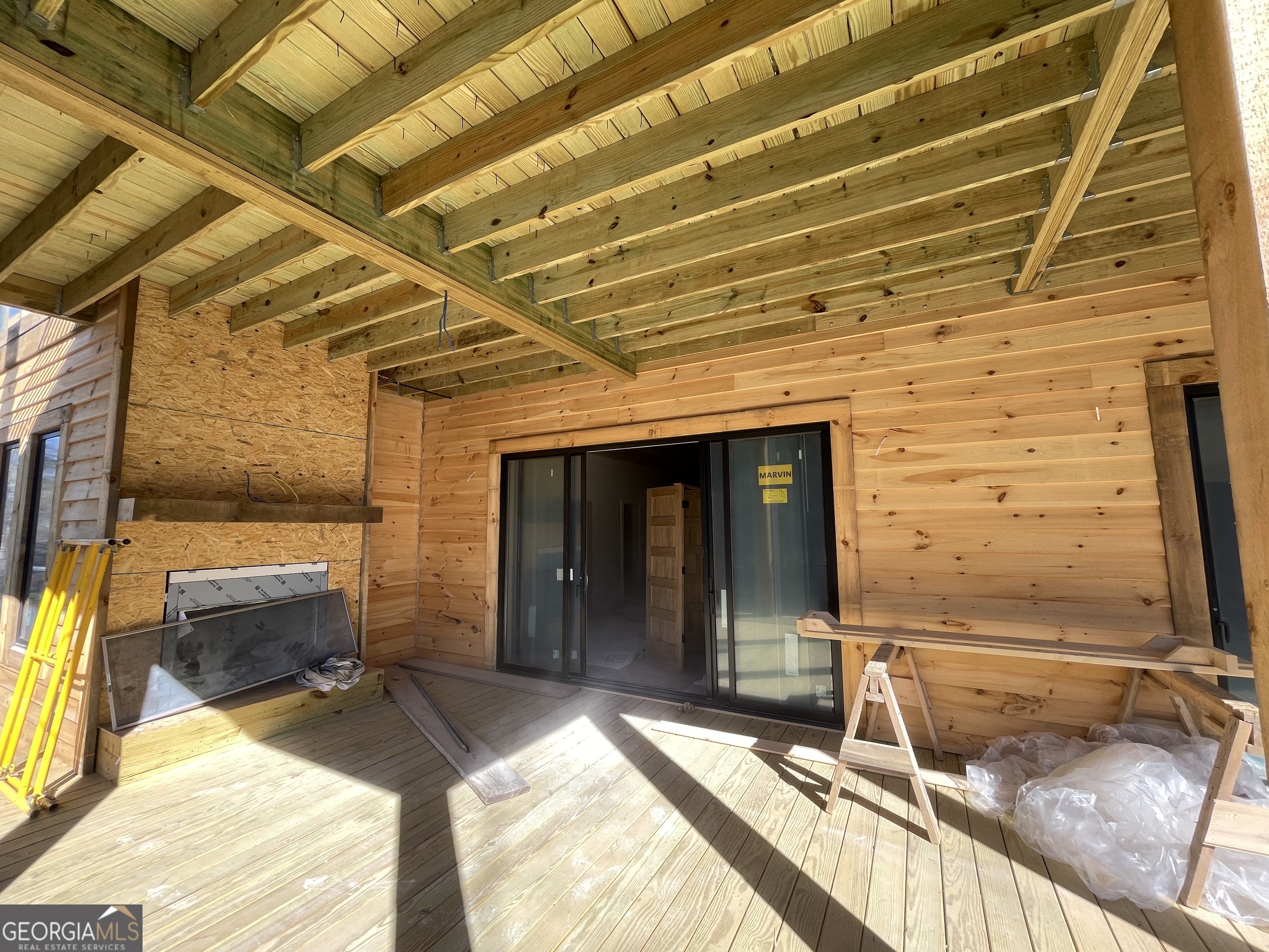 19 River Chase Way Mineral Bluff, GA 30559 - Photo 25 of 53 a view of a balcony with chair and the ceiling fan