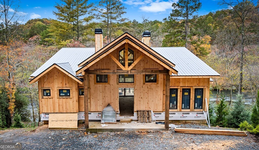 19 River Chase Way Mineral Bluff, GA 30559 - Photo 39 of 53 a front view of a house with a yard