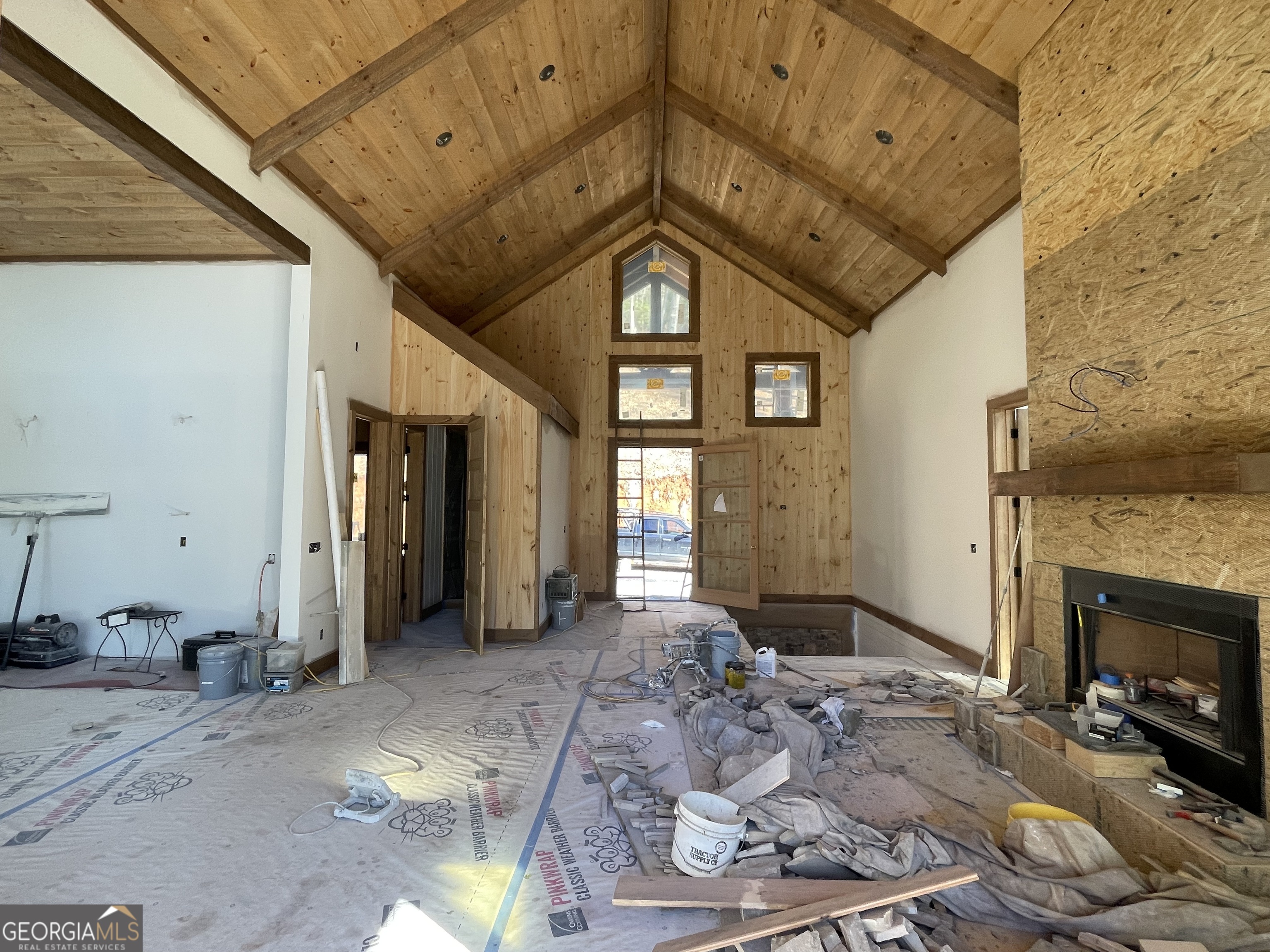 19 River Chase Way Mineral Bluff, GA 30559 - Photo 7 of 53 a view of a hallway with wooden floor and a fireplace