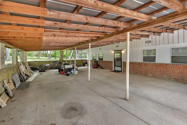a view of parking garage with cars
