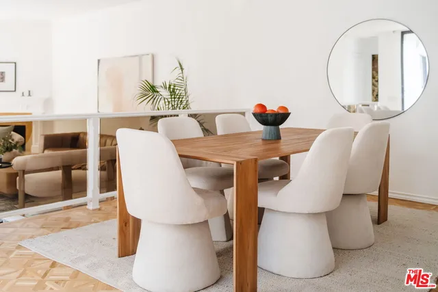 a reading room with furniture and wooden floor