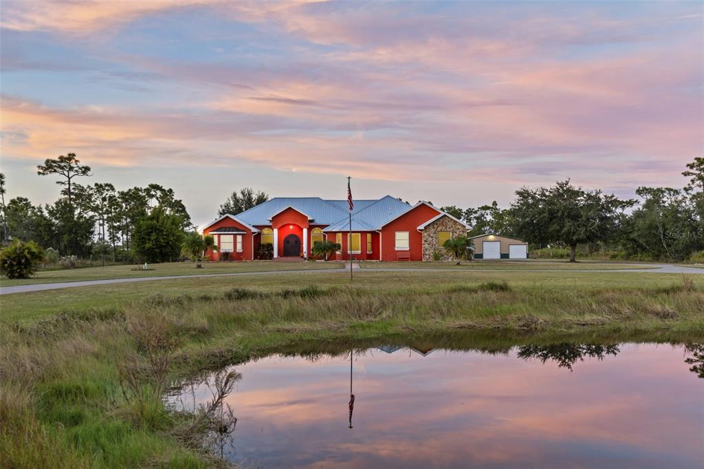 a view of a town with big trees