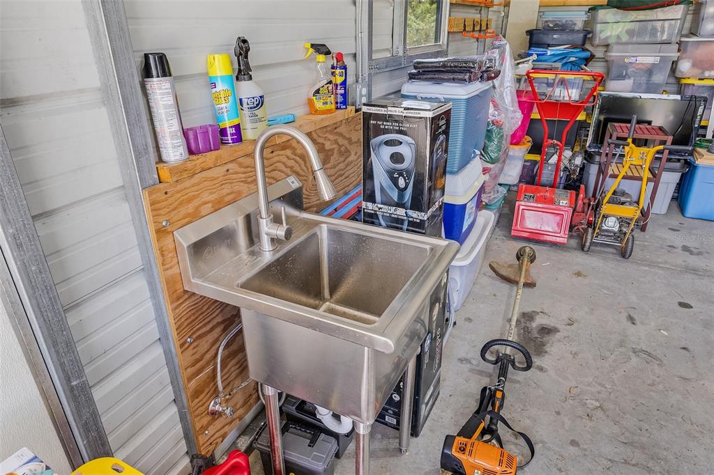 29336 Sam Way Punta Gorda, FL 33982 - Photo 36 of 44 a utility room with dryer and washer