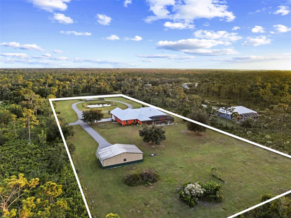 29336 Sam Way Punta Gorda, FL 33982 - Photo 41 of 44 a view of a balcony with an ocean
