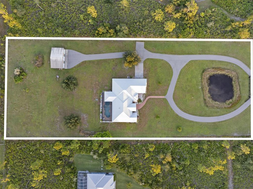 29336 Sam Way Punta Gorda, FL 33982 - Photo 42 of 44 an aerial view of a swimming pool