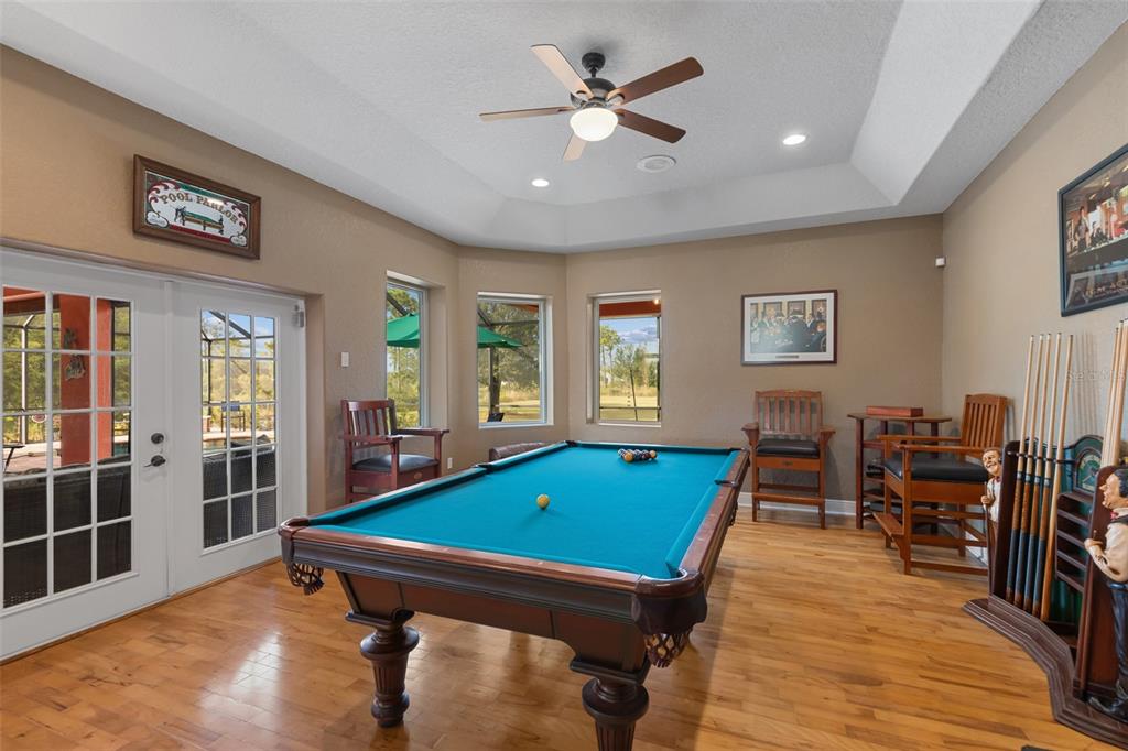 29336 Sam Way Punta Gorda, FL 33982 - Photo 9 of 44 a room with furniture pool table and windows