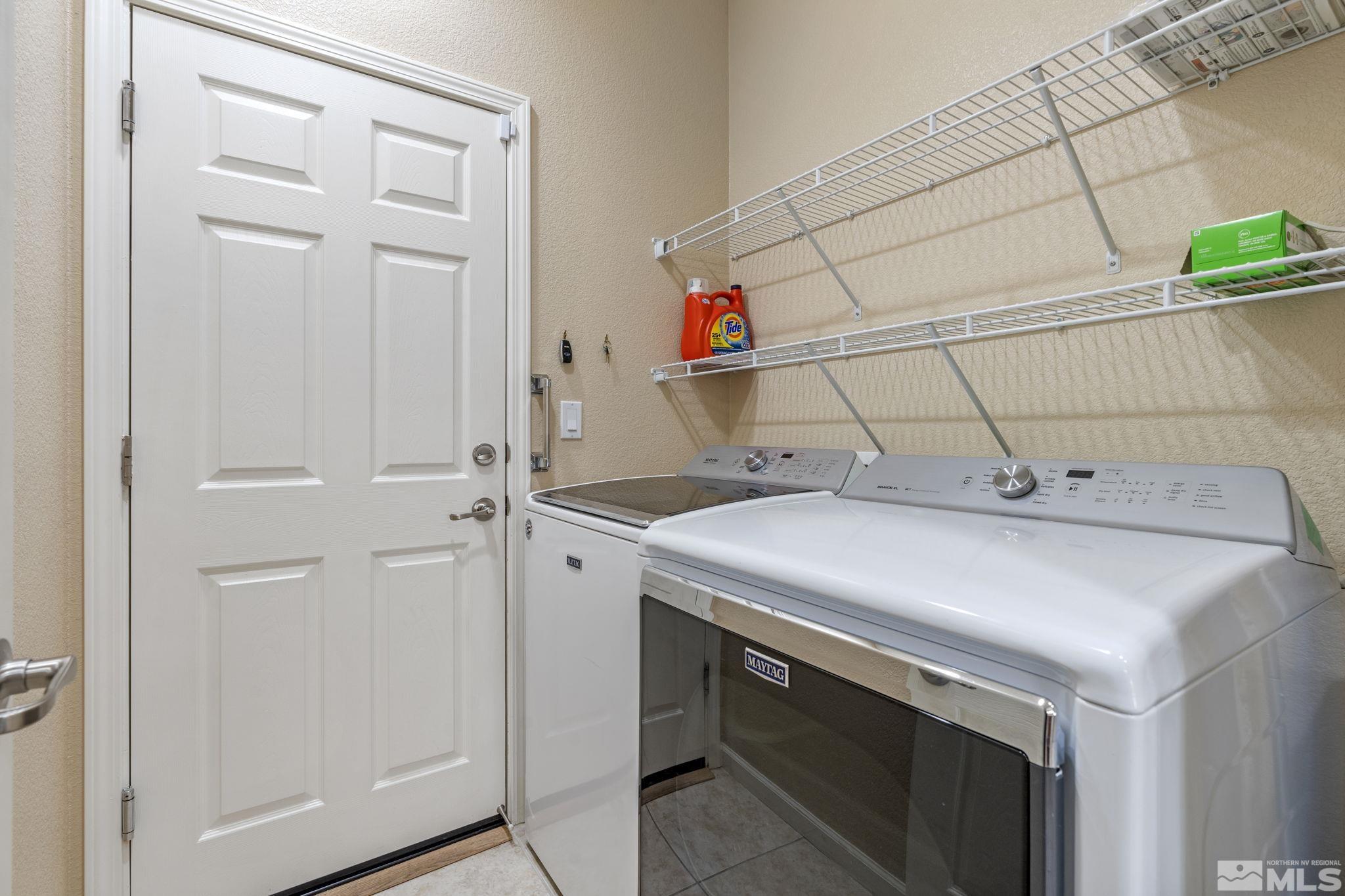 10848 Oakhaven Drive Reno, NV 89521 - Photo 27 of 32 a utility room with dryer and washer