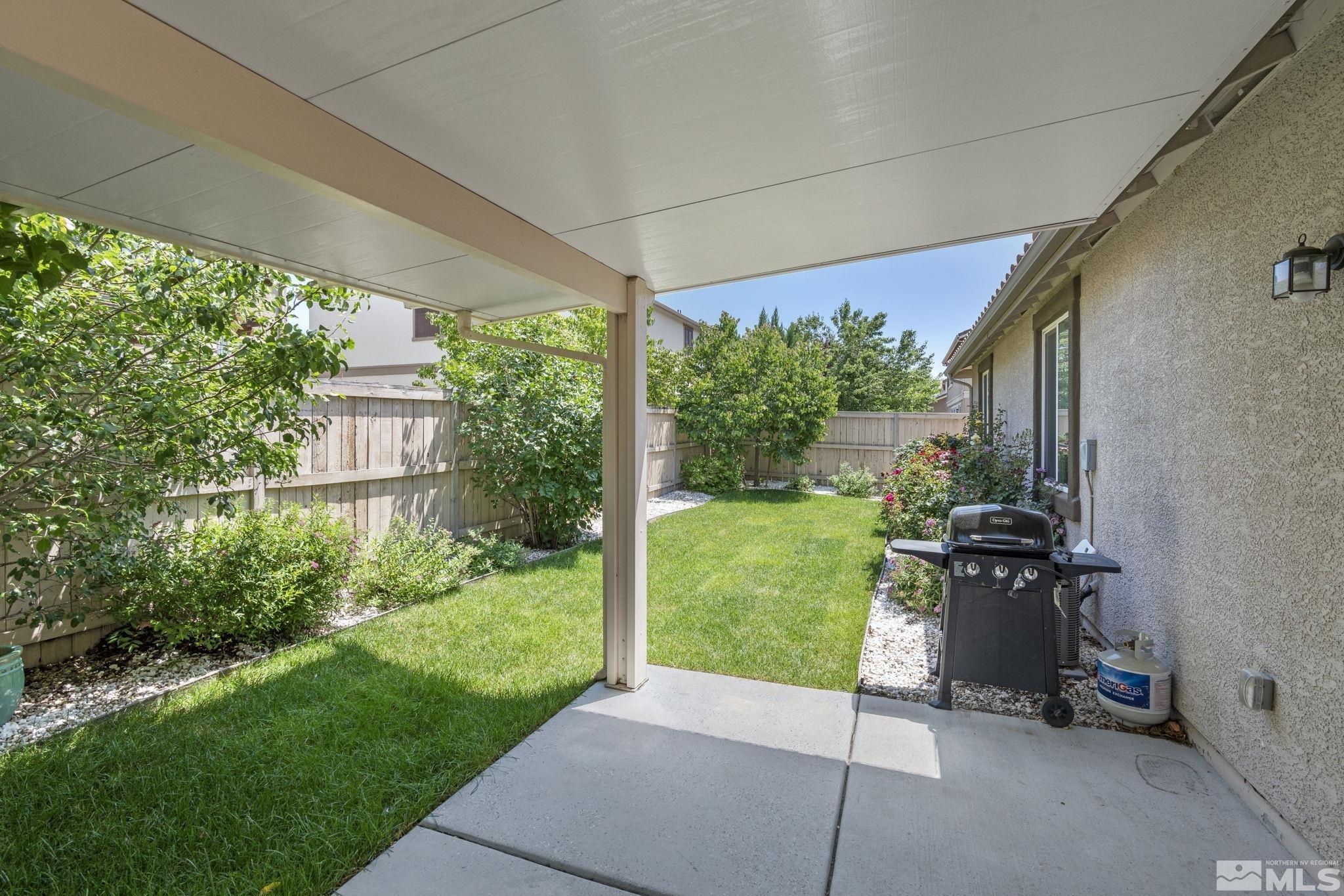 10848 Oakhaven Drive Reno, NV 89521 - Photo 28 of 32 a view of a garden with a patio