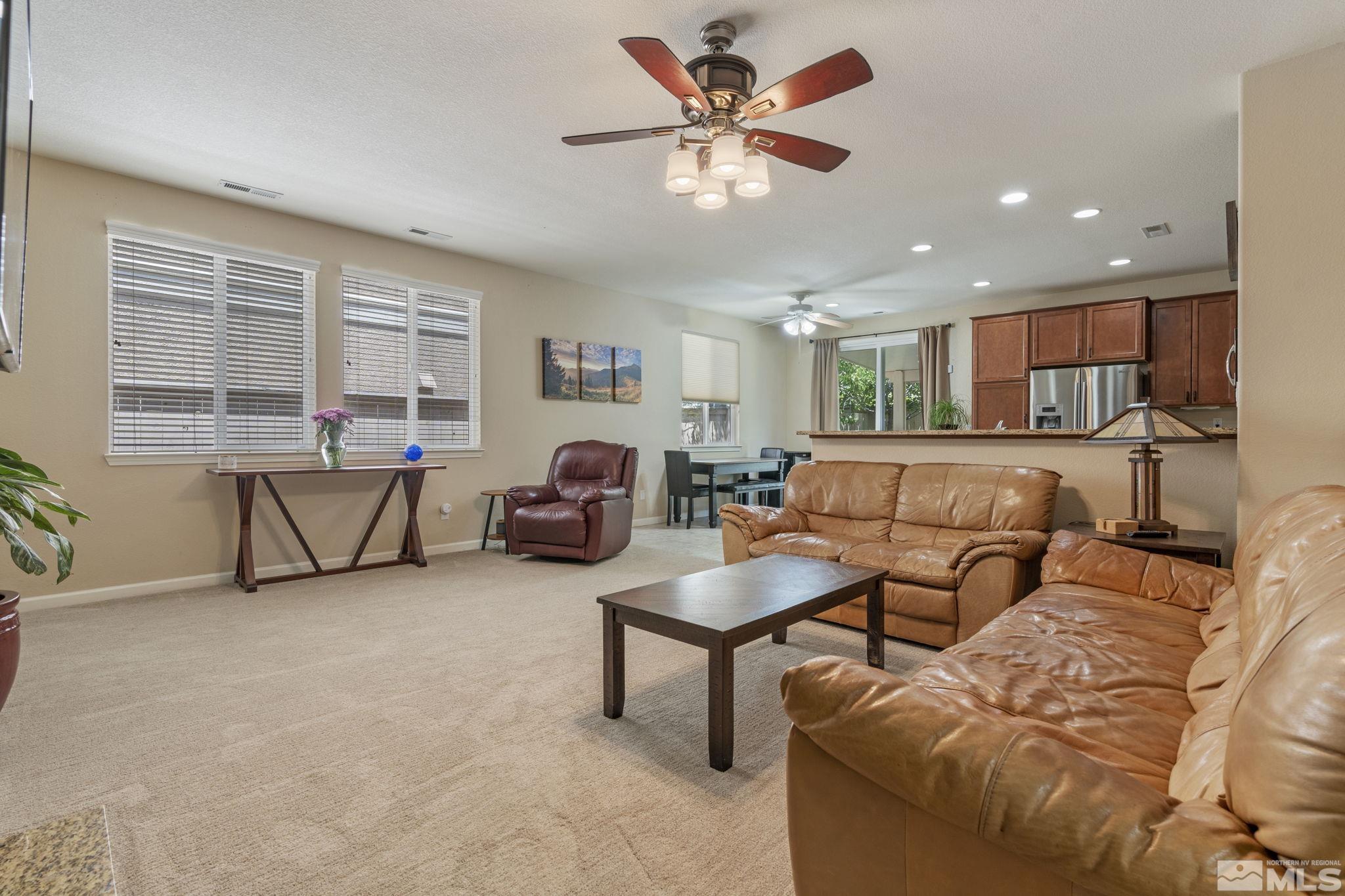 10848 Oakhaven Drive Reno, NV 89521 - Photo 6 of 32 a living room with furniture and a large window