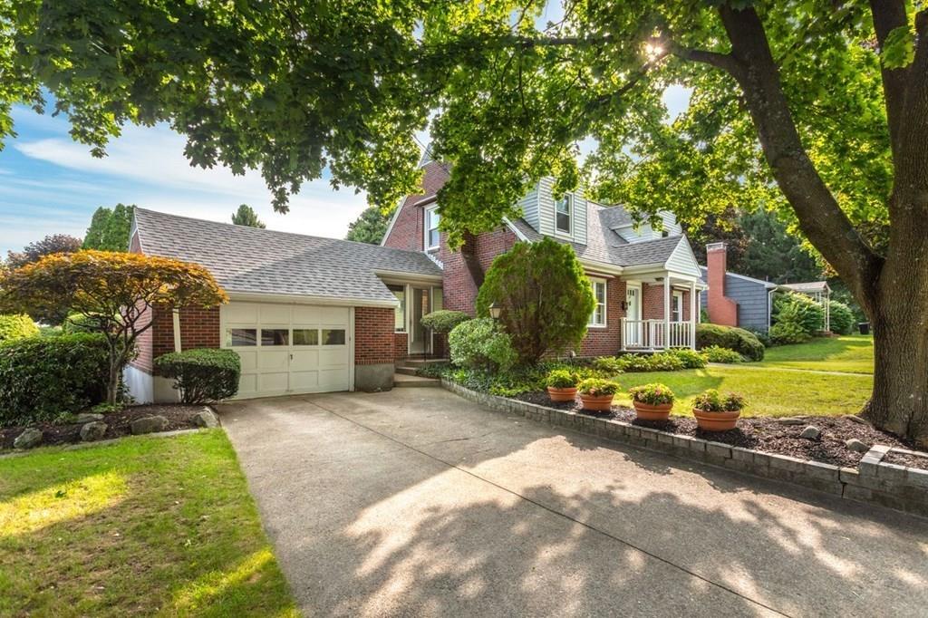 28 Pershing Avenue Framingham, MA 01702 - Photo 1 of 22 a front view of a house with garden