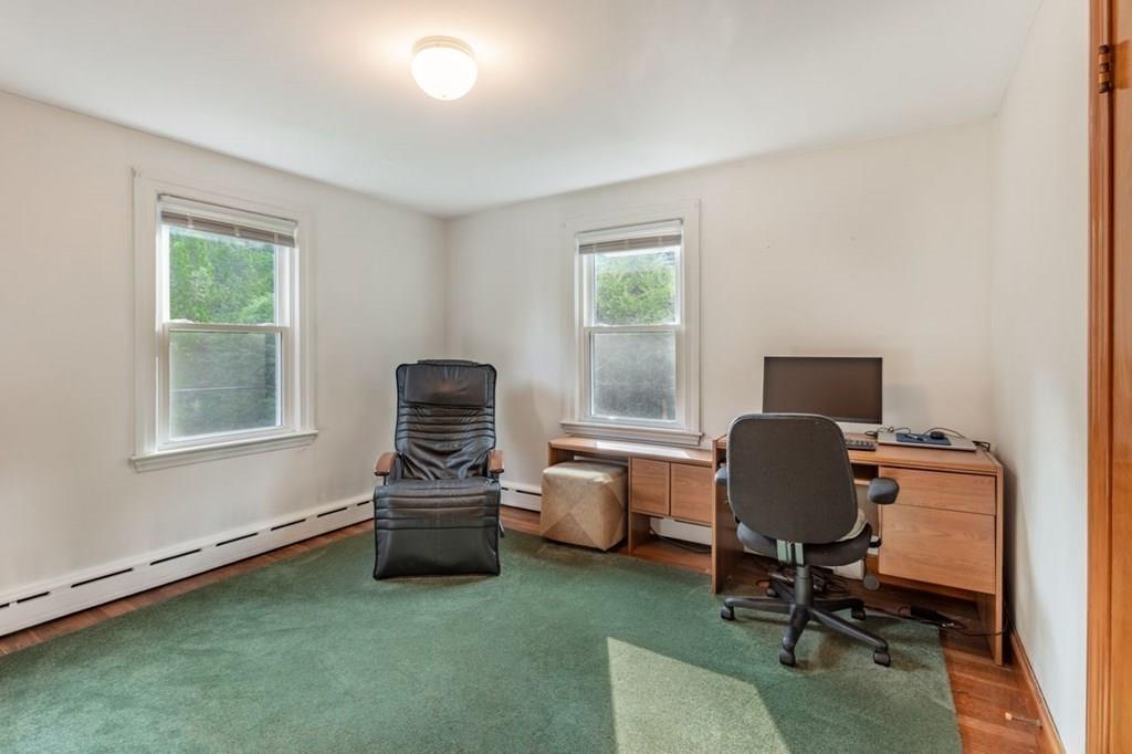 28 Pershing Avenue Framingham, MA 01702 - Photo 12 of 22 a livingroom with workspace and a window