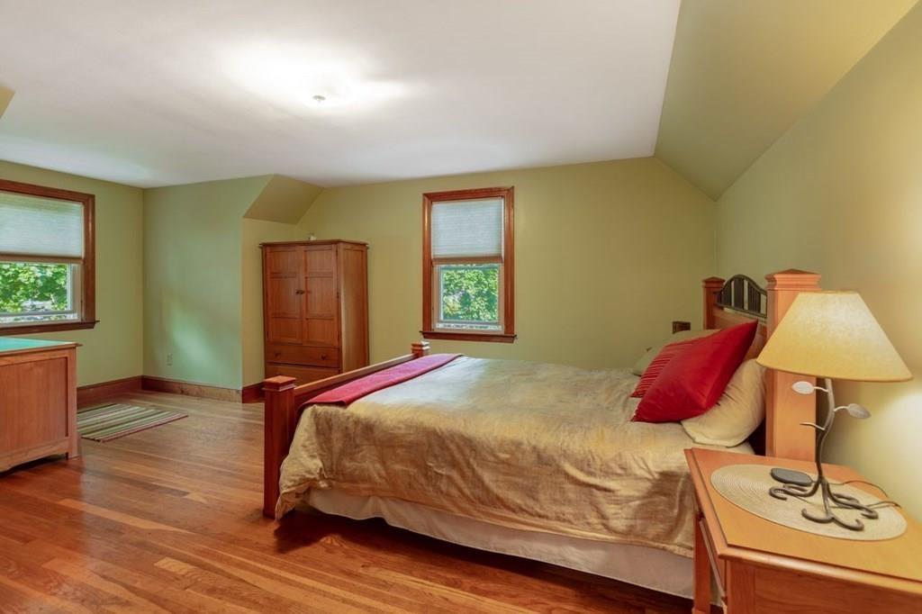28 Pershing Avenue Framingham, MA 01702 - Photo 14 of 22 a bedroom with a bed and a window