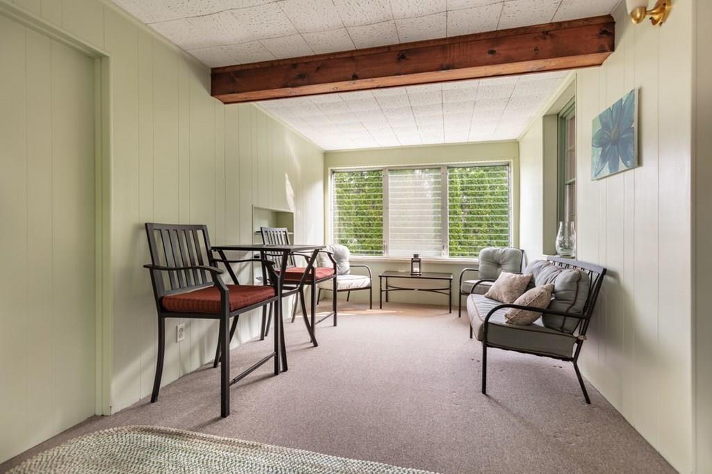 28 Pershing Avenue Framingham, MA 01702 - Photo 18 of 22 a living room with furniture and a large window