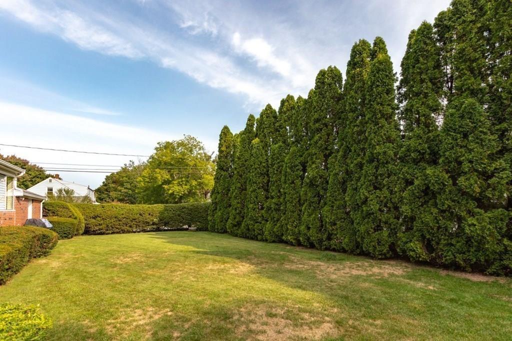 28 Pershing Avenue Framingham, MA 01702 - Photo 20 of 22 a view of a yard with an outdoor space