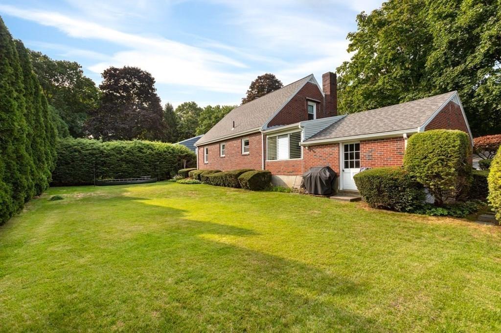 28 Pershing Avenue Framingham, MA 01702 - Photo 22 of 22 a view of a house with swimming pool and yard