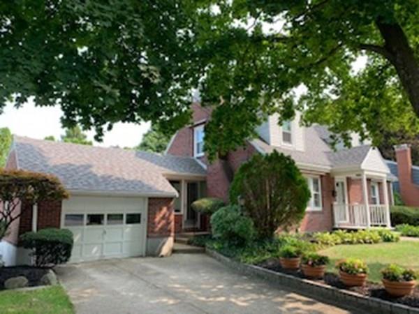 28 Pershing Avenue Framingham, MA 01702 - Photo 3 of 22 a front view of a house with garden