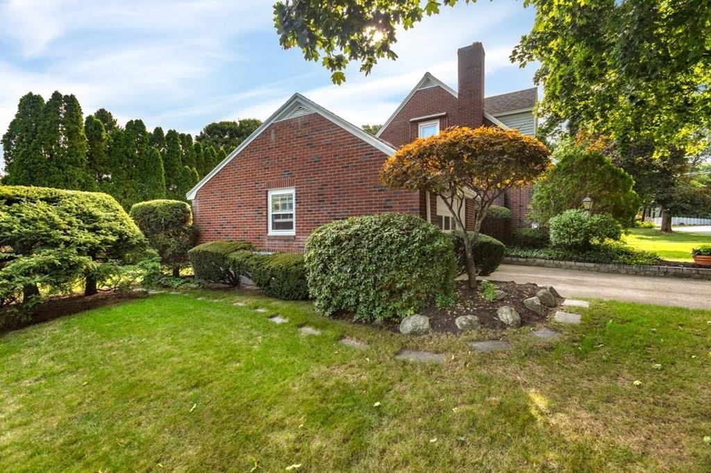 28 Pershing Avenue Framingham, MA 01702 - Photo 4 of 22 a view of a house with a garden