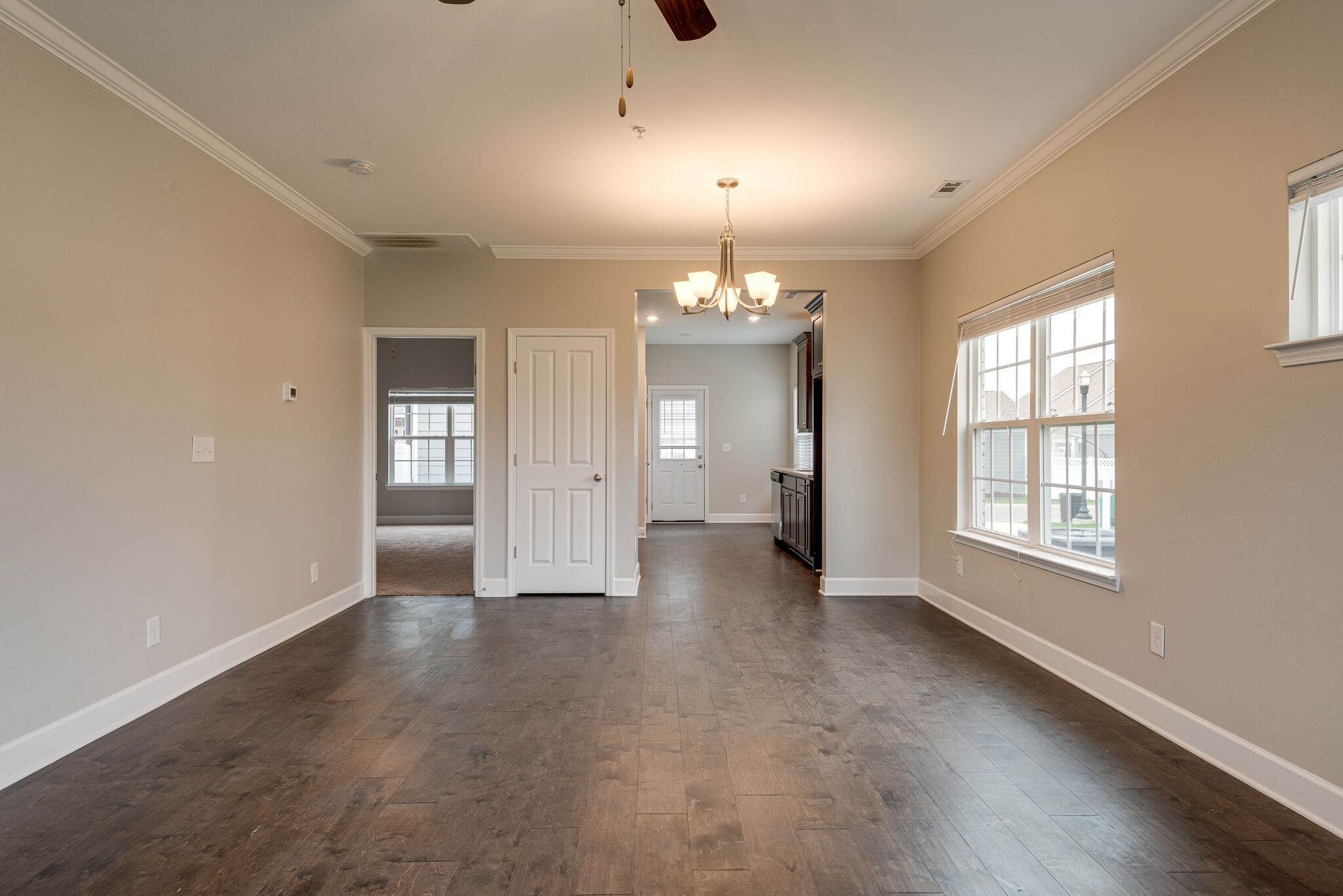 269 Mary Ann Circle Spring Hill, TN 37174 - Photo 4 of 28 wooden floor in an empty room with a window