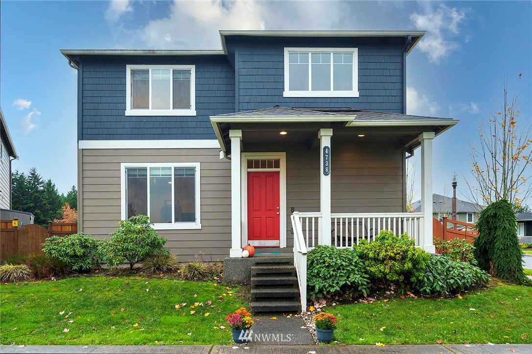 4738 Court R Tacoma, WA 98404 - Photo 1 of 32 a front view of a house with garden
