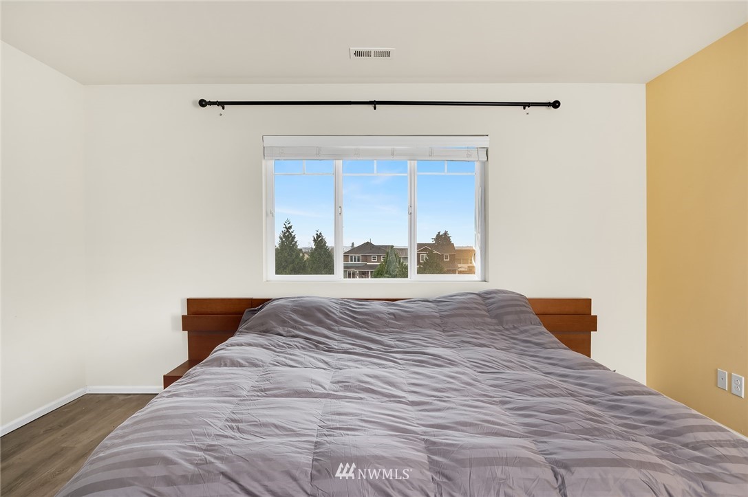 4738 Court R Tacoma, WA 98404 - Photo 17 of 32 a bedroom with a bed and a window