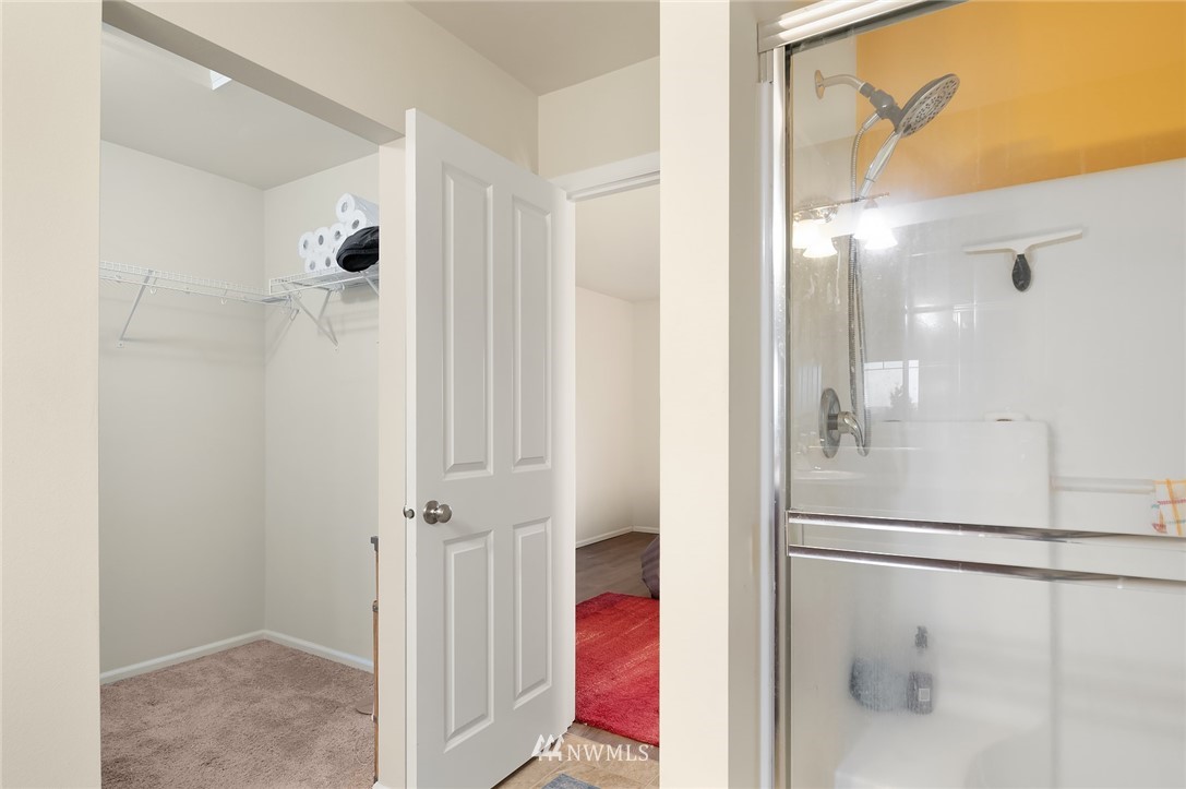 4738 Court R Tacoma, WA 98404 - Photo 19 of 32 a bathroom with a shower and a mirror