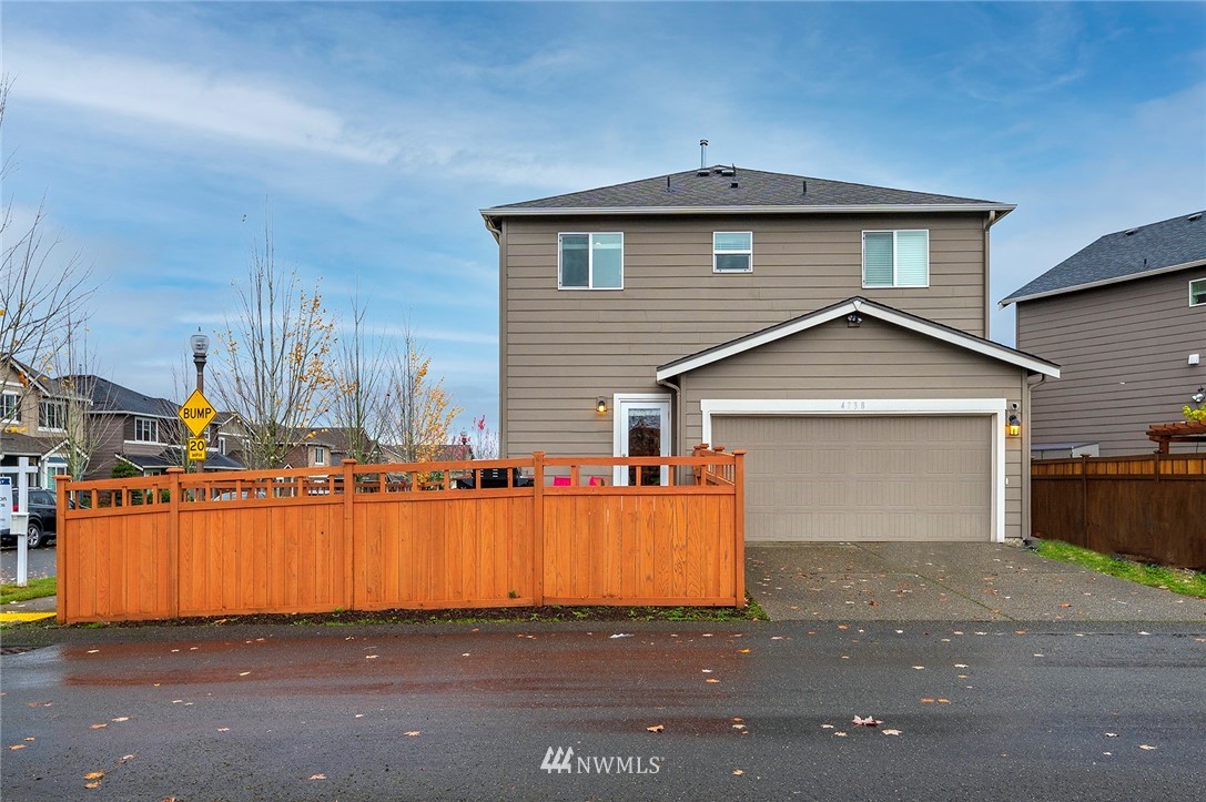 4738 Court R Tacoma, WA 98404 - Photo 26 of 32 a view of a house with a parking space