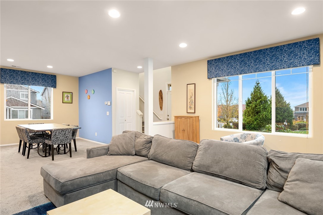 4738 Court R Tacoma, WA 98404 - Photo 8 of 32 a living room with furniture and large windows