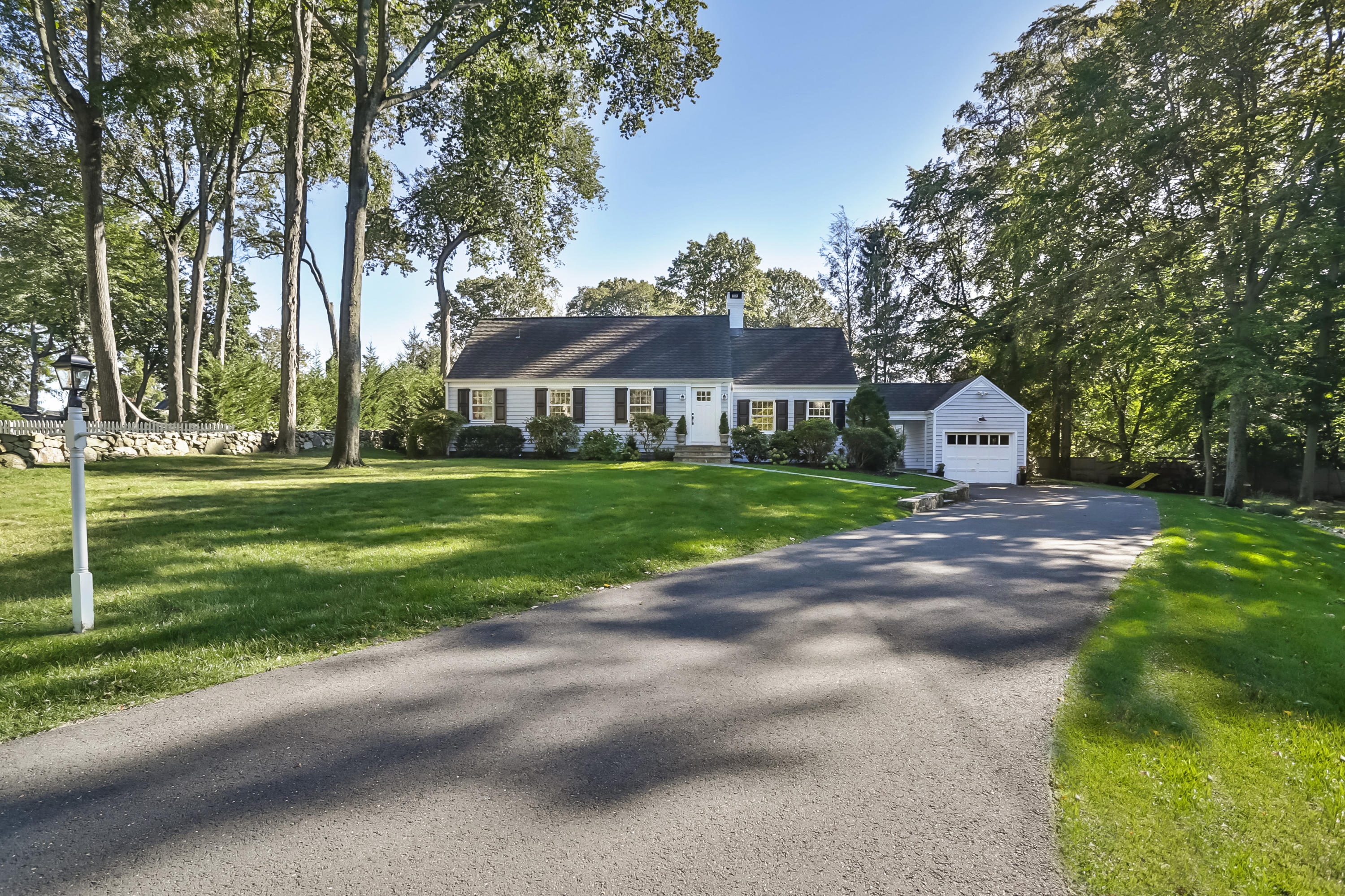 23 Rocaton Road Darien, CT 06820 - Photo 1 of 36 a view of a house with a yard