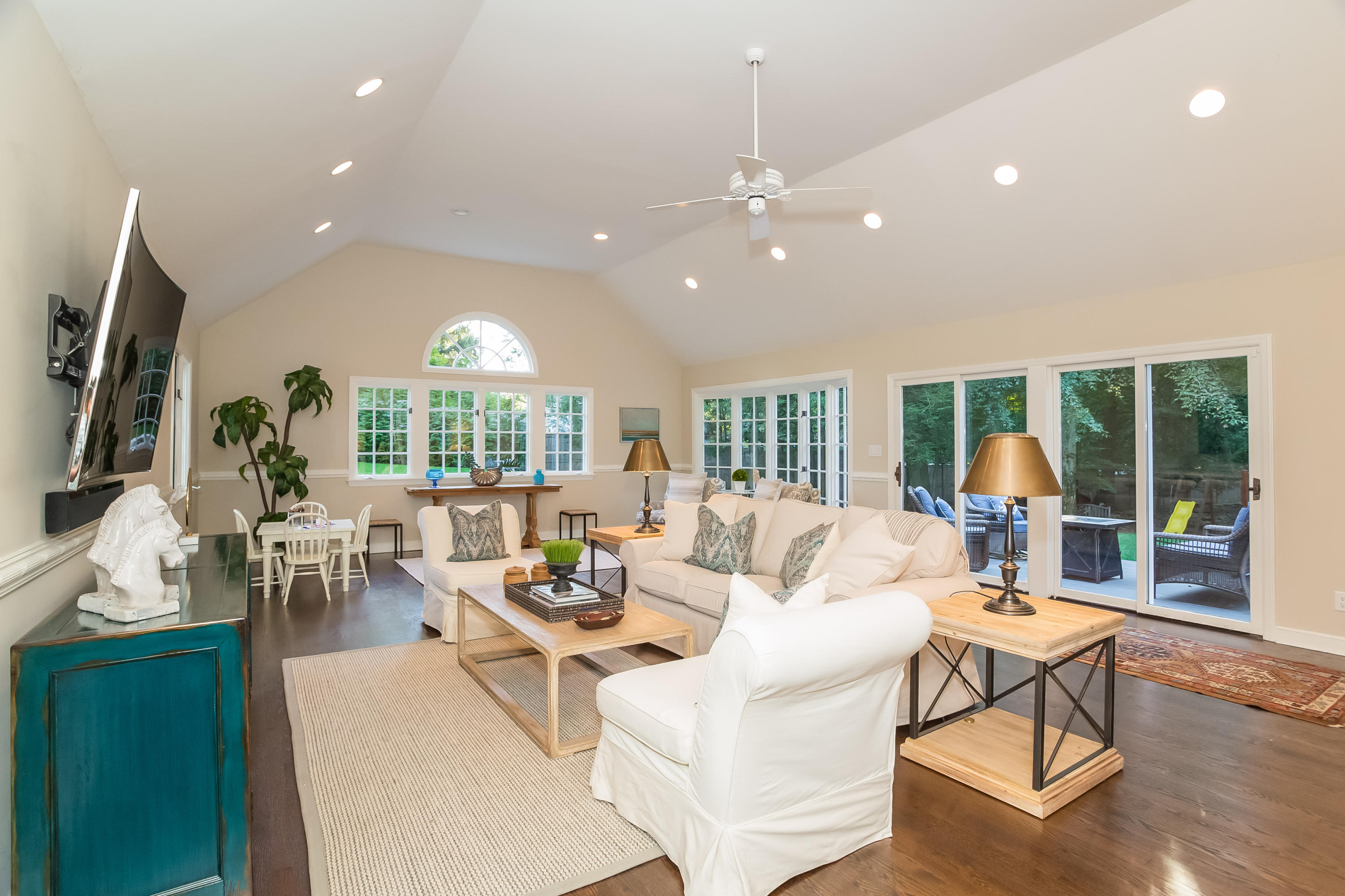23 Rocaton Road Darien, CT 06820 - Photo 11 of 36 a living room with furniture and a large window