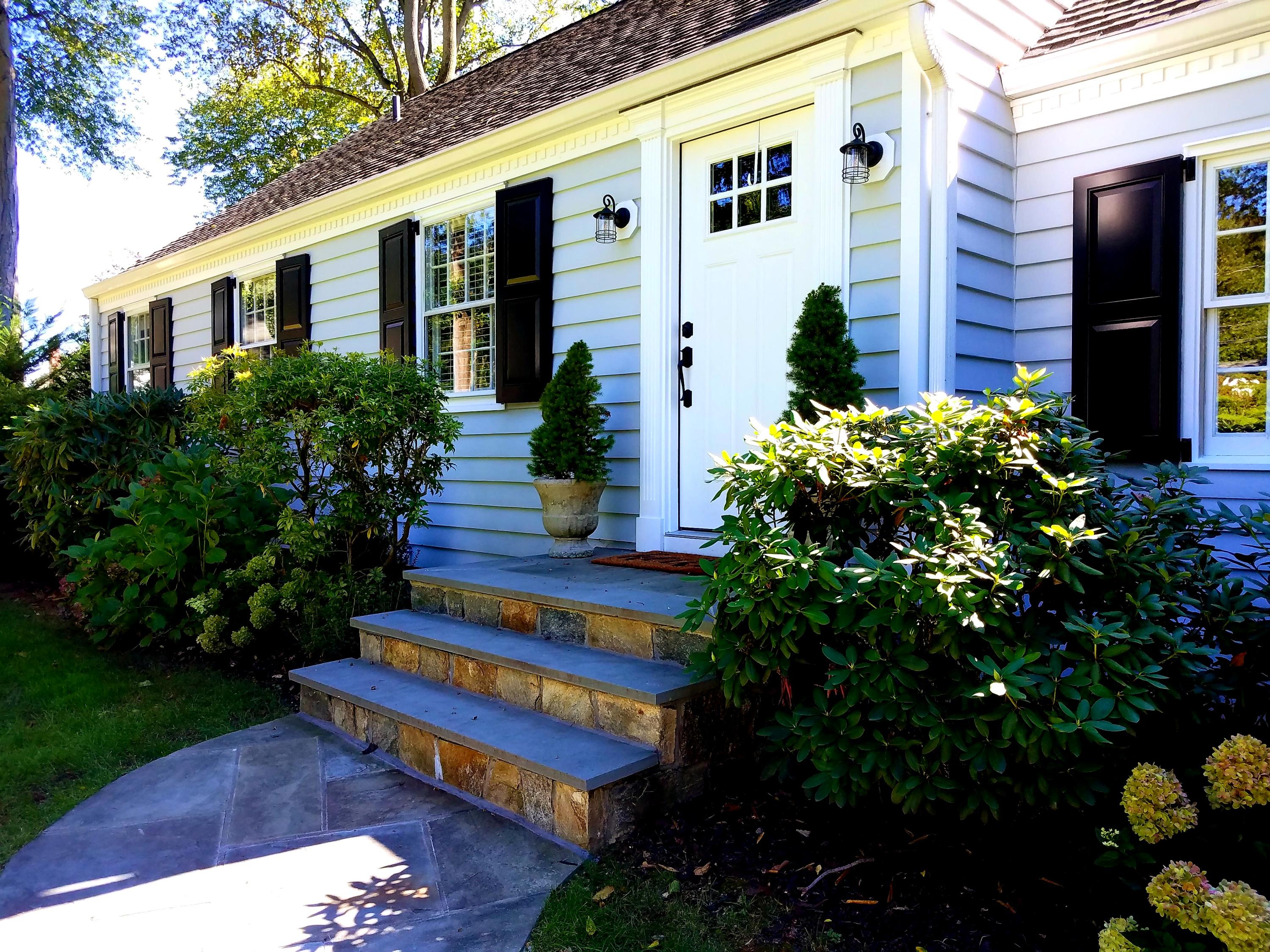 23 Rocaton Road Darien, CT 06820 - Photo 2 of 36 a house view with a garden space