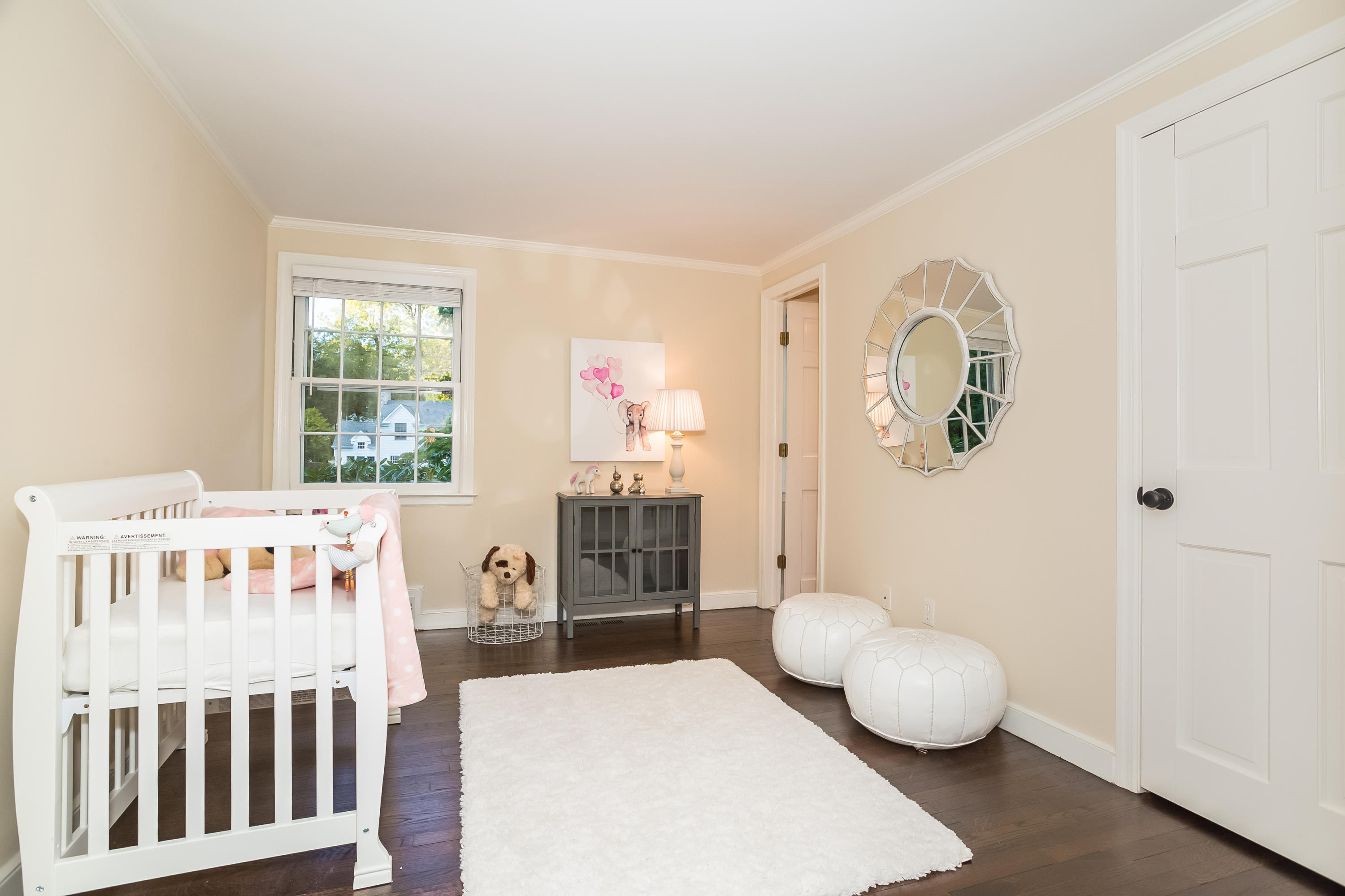 23 Rocaton Road Darien, CT 06820 - Photo 21 of 36 a living room with furniture and a window