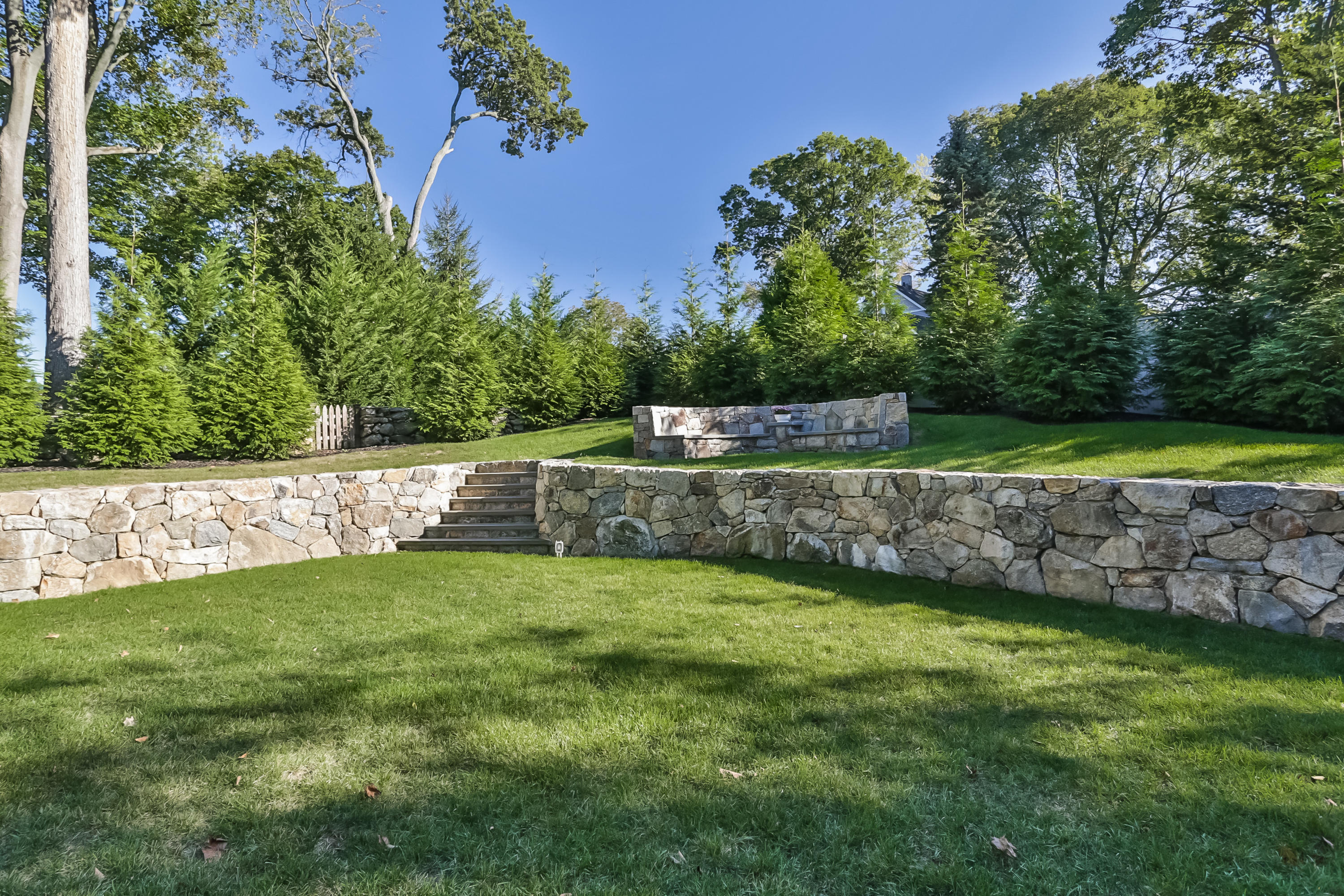 23 Rocaton Road Darien, CT 06820 - Photo 28 of 36 a view of a backyard