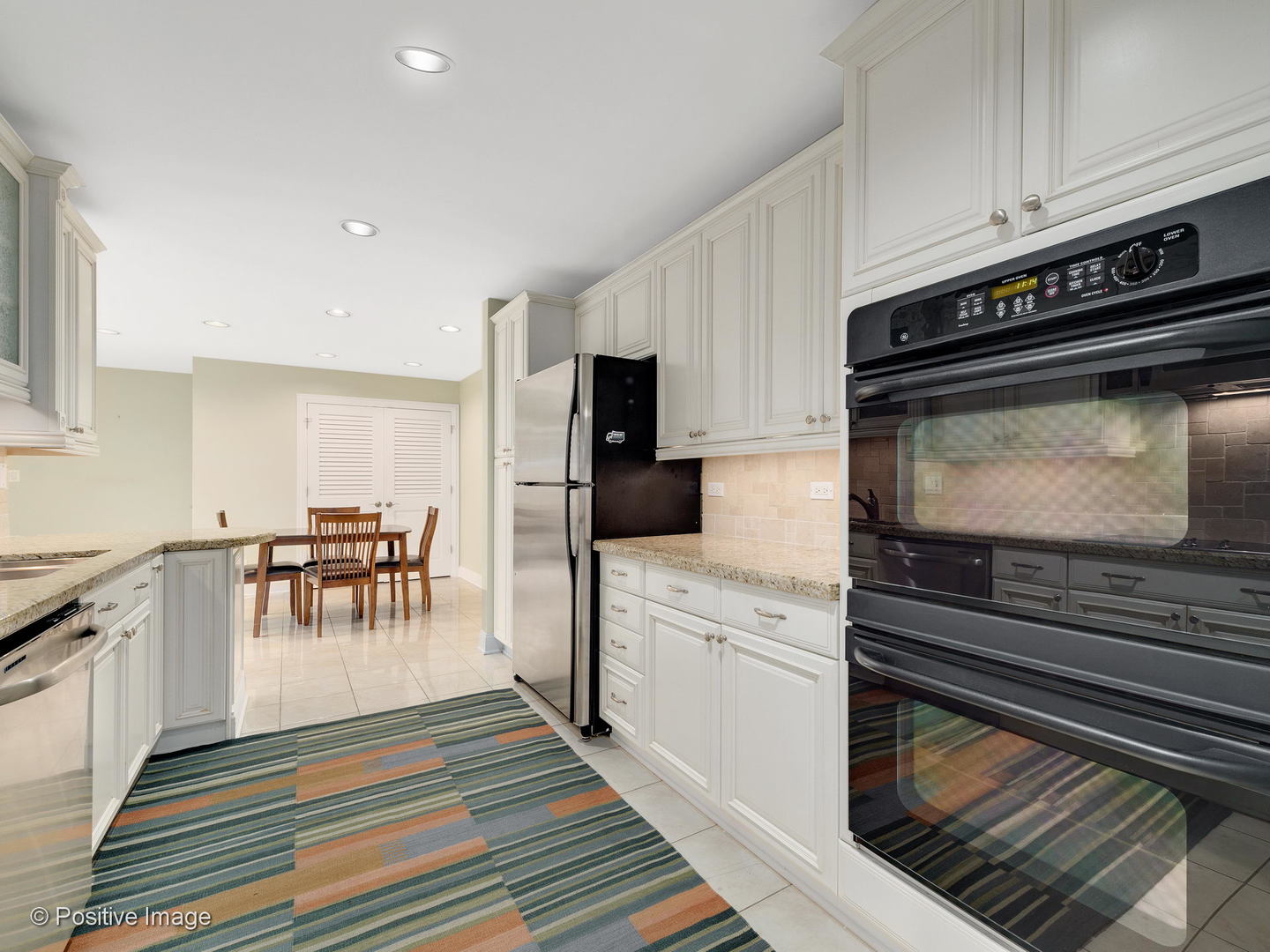 1228 Indian Trail Road Hinsdale, IL 60521 - Photo 11 of 27 a kitchen with sink and cabinets