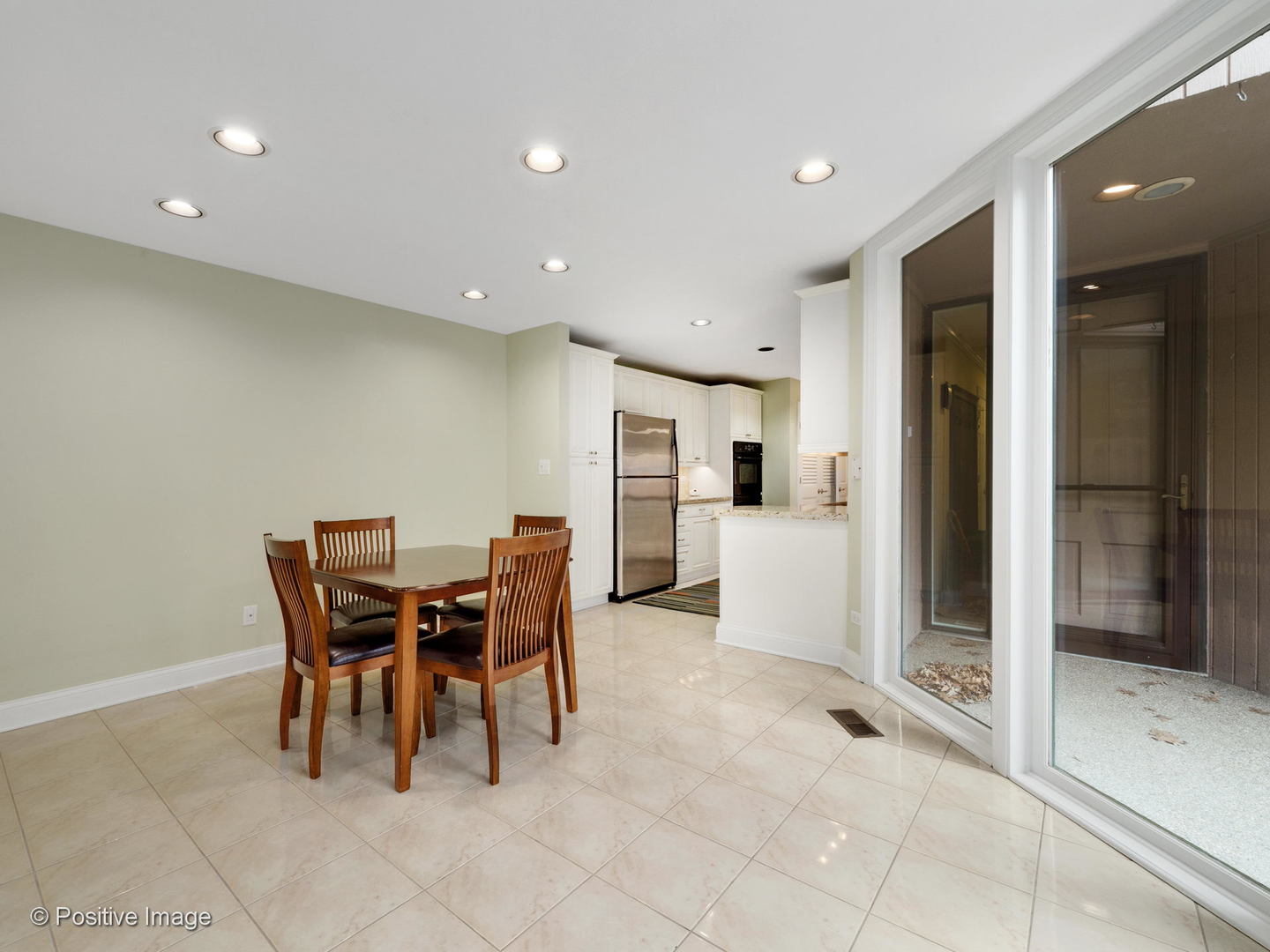1228 Indian Trail Road Hinsdale, IL 60521 - Photo 13 of 27 a view of a dining room with furniture