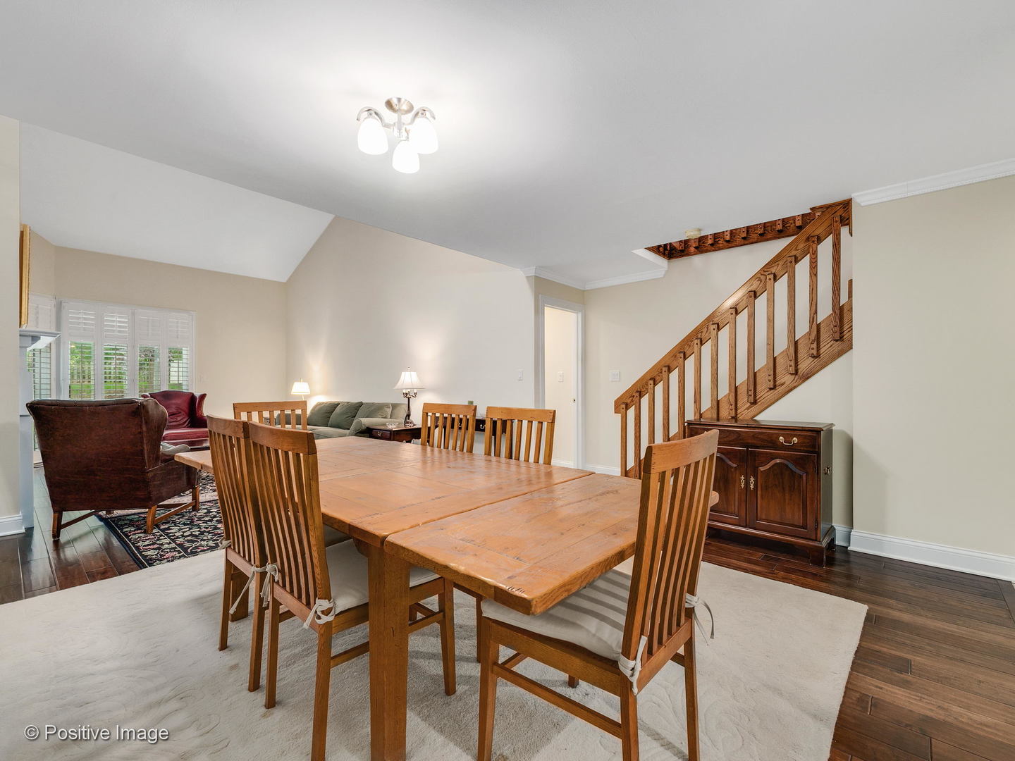 1228 Indian Trail Road Hinsdale, IL 60521 - Photo 4 of 27 a view of a dining room with furniture and wooden floor