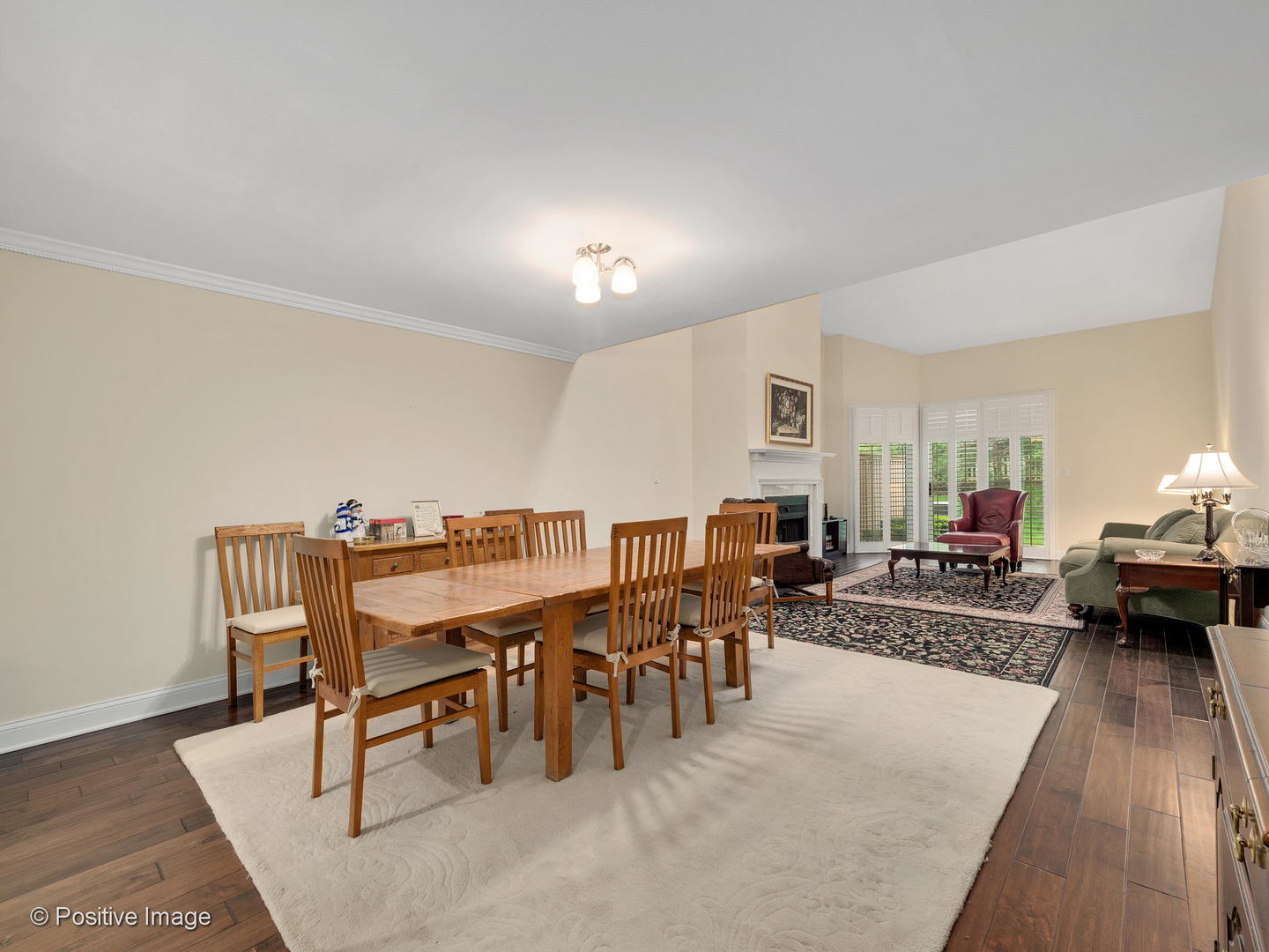 1228 Indian Trail Road Hinsdale, IL 60521 - Photo 5 of 27 a view of a dining room with furniture and wooden floor